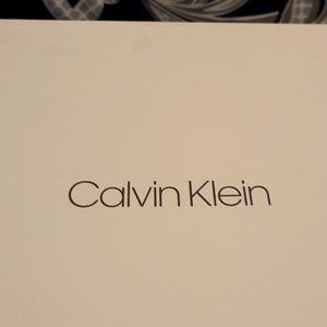 Calvin Klein black leather New in box.